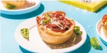  ?? LAURA CHASE DE FORMIGNY FOR THE WASHINGTON POST ?? For Muffin Tin Deep-Dish Pepperoni Pizza, you mix-and-match your toppings, adding about a quarter cup of them per muffin.