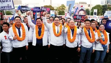  ?? — Reuters photo ?? File photo shows Savanayana and election candidates attending the last party campaign rally outside a stadium in central Bangkok, Thailand.