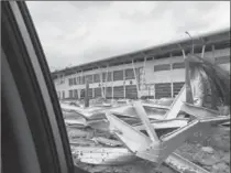  ?? DULANI SAMARAPPUL­I, THE CANADIAN PRESS ?? Debris lies scattered at St. Maarten’s Princess Juliana Internatio­nal Airport after hurricane Irma pummelled the island.