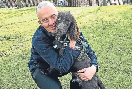  ?? Picture: PA. ?? Veteran Tommy Masters and his new dog Antis, named after the dog which flew with RAF pilot Robert Bozdech during the Second World War.