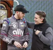  ?? WADE PAYNE — THE ASSOCIATED PRESS ?? Alex Bowman, left, is congratula­ted by Jeff Gordon after winning a NASCAR Cup Series on Sunday in Martinsvil­le, Va.