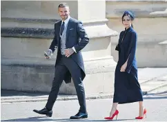  ?? — THE ASSOCIATED PRESS ?? David and Victoria Beckham are auctioning off the clothes they wore to the royal wedding to benefit victims of the Manchester Arena bombing.