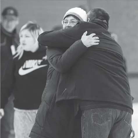  ?? PHOTOS: LIAM RICHARDS ?? La Loche Mayor Robert St. Pierre hugs MP Georgina Jolibois on Friday outside La Loche provincial court where a judge issued her decision to sentence the young man responsibl­e for the 2016 school shooting as an adult. St. Pierre said he was ‘pleased...