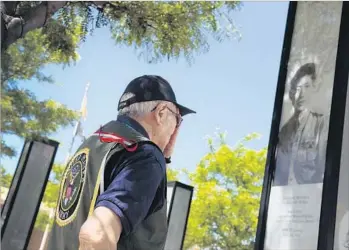  ?? Rick Loomis Los Angeles Times ?? HIROSHI MIYAMURA, 91, at a pillar in Gallup, N.M., commemorat­ing his Korean War service. During World War II, when Japanese Americans were interned, Gallup refused to round up its Japanese residents.