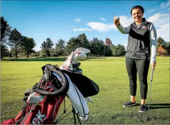  ?? PHOTO / WARREN BUCKLAND. ?? Lucy Owen shows the ball she scored her holein-one with while in her third year at the University of Arkansas Little Rock. She is back home in CHB for a few months and will be hosting her annual fundraisin­g tournament at Waipawa Golf Club on Monday.