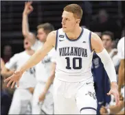  ?? MITCHELL LEFF / GETTY IMAGES ?? Donte DiVincenzo scored 18 points Sunday as Villanova (10-0) topped La Salle 77-68.