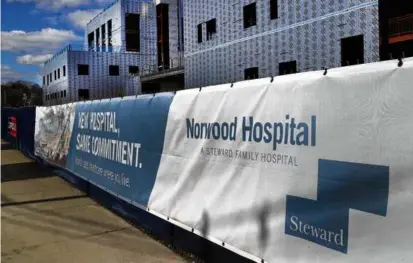  ?? JOHN TLUMACKI/GLOBE STAFF ?? Norwood Hospital is still under constructi­on and the completion has been delayed by Steward Health Care.