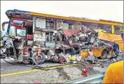  ?? PTI ?? Wreckage of a bus after a Delhi-bound bus rammed into it on Purvanchal Expressway on Monday.