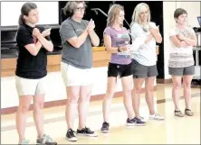 ?? Lynn Atkins/The Weekly Vista ?? The kindergart­en team at Cooper Elementary School used a rewritten version of "The Addams Family" theme song to present their solution to a murder mustery during a team-building event last week.