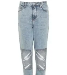  ?? TOPSHOP ?? Topshop’s clear-panel mom jeans have a high waist, tapered leg and clear plastic panels covering the knees.