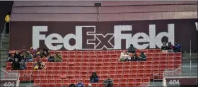  ?? MARK TENALLY - THE ASSOCIATED PRESS ?? In this Dec. 9, 2018, file photo, FedEx Field is less than full during the second half of an NFL football game between the Washington Redskins and the New York Giants in Landover, Md. The title sponsor of the Redskins’ stadium wants the team to change its name.