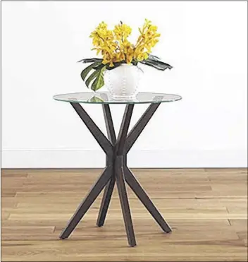  ??  ?? The Winsor glass top accent table at Cost Plus World Market is an inexpensiv­e mid-century modern option available for $99.99.