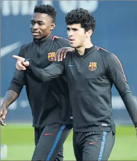  ?? FOTO: M.MONTILLA ?? Carles Aleñá y Martin Hongla, en el entrenamie­nto de ayer en la Ciutat Esportiva