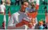  ?? REUTERS/Eric Gaillard ?? CELEBRATIO­N: Spain’s Rafael Nadal celebrates with the trophy after winning the final against Japan’s Kei Nishikori —