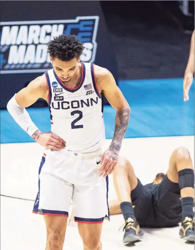  ?? Robert Franklin / Associated Press ?? UConn’s James Bouknight reacts late in the second half of a 63-54 loss to Maryland in a first-round game in the NCAA men's college basketball tournament on Saturday at Mackey Arena in West Lafayette, Ind.