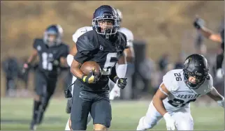  ?? PHOTO BY MICHAEL OWEN BAKER ?? Sierra Canyon QB Alonzo Contreras got the start against Westlake. Here he runs for a touchdown against Servite.
Real): Who is going to stop Camdan McWright? He ran for 240yards and two touchdowns on 17 carries in the team’s 42-12 win
The Vikings are back on track after a 52-0 win over Canyon.
Next: at Hart, Friday
— Tarek Fattal