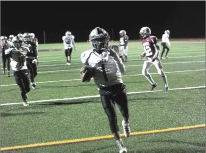  ?? Photo by Ernest A. Brown ?? Shea running back Julius Gillard rushed for four touchdowns and returned a punt for another score to lead the Raiders to a 32-0 victory over Woonsocket Wednesday night to win the freshman Division II title at Johnston High.