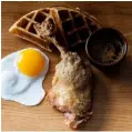  ??  ?? London’s highest restaurant (at 175m tall) Duck &amp; Waffle, top, offers extraordin­ary views of the City as well as food to match, including its famed namesake dish, above
