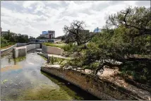  ?? TOM MCCARTHY JR. FOR AMERICAN-STATESMAN ?? Work will begin today on the Waller Creek Conservanc­y’s project to create a string of parks along downtown’s eastern edge, running along the creek made less flood-prone by the Waller Creek Tunnel.