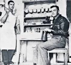  ?? ?? Eric Brown (right), 51st Highland Division, with Red Cross supplies in a POW kitchen, 1941