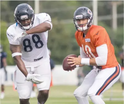 ?? ASHLEE REZIN/SUN-TIMES ?? Bears quarterbac­k Mitch Trubisky (10) has been bedeviled by intercepti­ons during training camp.
