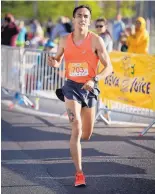  ??  ?? Dylan Villescas, a 26-year-old from Las Cruces, wins the half-marathon during the 33rd annual Run for the Zoo on Sunday. He won in 1 hour, 10 minutes, 50 seconds.