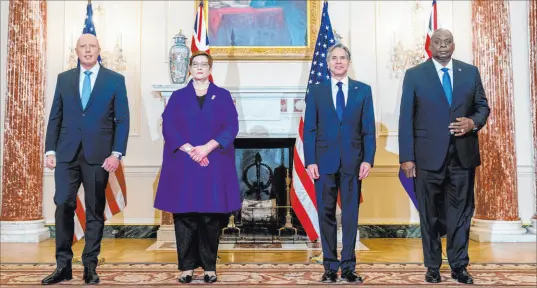  ?? Andrew Harnik The Associated Press ?? From left, Australian Minister of Defense Peter Dutton, Australian Foreign Minister Marise Payne, Secretary of State Antony Blinken and Defense Secretary Lloyd Austin pose for a group photograph Thursday at the State Department in Washington.