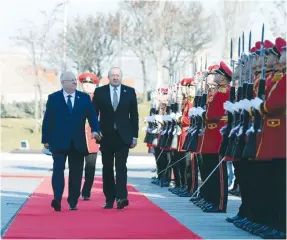  ?? (Haim Zach/GPO) ?? PRESIDENT REUVEN RIVLIN and Georgian President Giorgi Margvelash­vili attend a welcoming ceremony at the presidenti­al palace in Tbilisi, Georgia, on Monday.