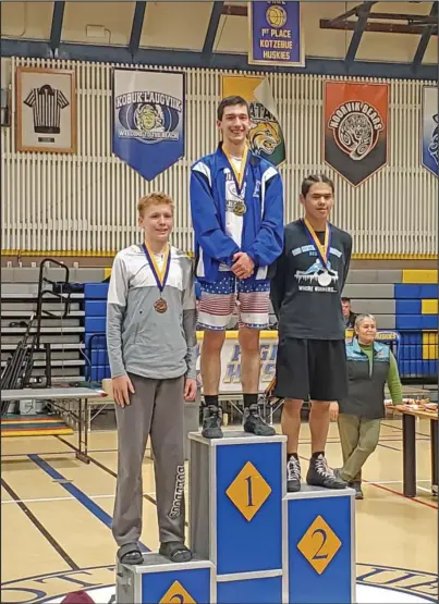  ?? Photo by Josh Marble ?? 135 LBS – JJ Marble is the champion, Chase Noongwook of Savoonga placed second and Brady Bostic of Nikiski in third.