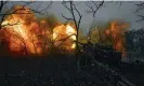  ?? Photograph: Libkos/AP ?? A member of Ukraine’s armed forces fires artillery at Russian positions near Bakhmut, Donetsk region, on Sunday.