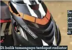  ??  ?? Di balik tamengnya terdapat radiator besar yang siap mendingink­an suhu mesin