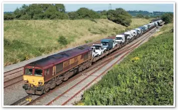  ??  ?? 66030 passes Pilning with the 1733 Portbury-Mossend train on July 24 2012. Although it often conveyed just cars from Portbury to Mossend and Doncaster, this train was technicall­y part of the wagonload network and ceased in October 2017.