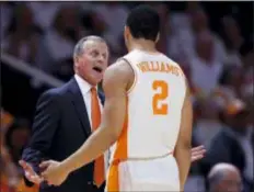  ?? AP PHOTO — WADE PAYNE ?? Tennessee coach Rick Barnes talks with forward Grant Williams (2) during the second half of an NCAA college basketball game against Florida on Saturday in Knoxville, Tenn. Tennessee won 73-61.