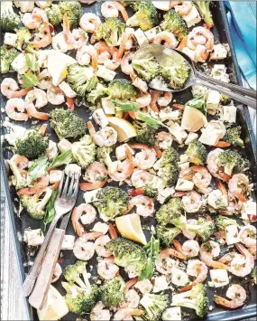  ?? Julia Konovalova / Reprinted with permission from The Ultimate One-Pan Oven Cookbook by Julia Konovalova, Page Street Publishing Co. 2018. ?? Roasted shrimp with feta and broccoli