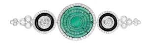  ??  ?? Ligne Graphique brooch in white gold set with a 19.87-carat Colombian cabochon emerald, onyx and pavé diamonds