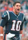  ??  ?? Jimmy Garoppolo of the New England Patriots reacts before a game against the Los Angeles Chargers last Sunday in Foxboro, Massachuse­tts.