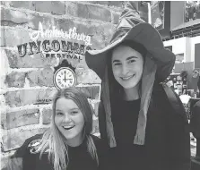  ?? DALSON CHEN ?? A “staycation” expo at the Devonshire Mall on Saturday prompted Jenna Lenders, left, and her friend Brenna Barrette, both 19, to consider attending some of the region’s festivals this summer.