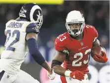  ?? Tim Ireland / Associated Press ?? Running back Adrian Peterson will have a bigger role as the Cardinals retool their offense after Carson Palmer’s injury.