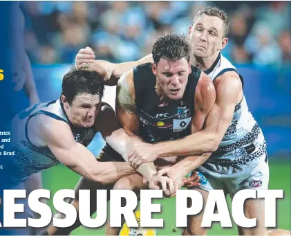  ?? Picture: WAYNE ?? GOT YA! Patrick Dangerfiel­d and Joel Selwood tackle Port’s Brad Ebert.