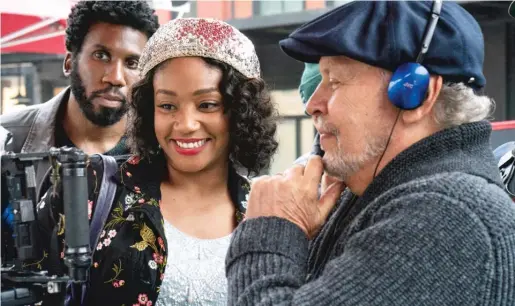  ?? SONY PICTURES ?? Tiffany Haddish and director Billy Crystal watch footage on the set of “Here Today.”