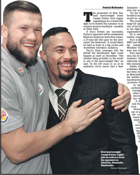  ?? Picture / Photosport ?? Kiwi heavyweigh­t Joseph Parker (right) gets an embrace from his opponent on Saturday, Alexander Dimitrenko.