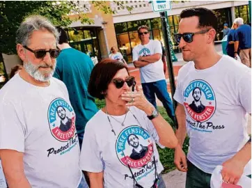  ?? JEFF KOWALSKY/GETTY-AFP ?? The parents of detained journalist Danny Fenster, Buddy and Rose Fenster, stand with Danny’s brother Bryan in Huntington Woods, Michigan, on June 4.