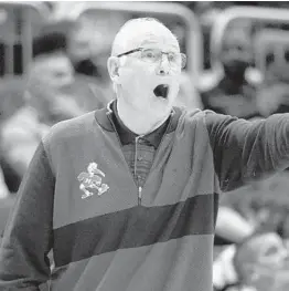  ?? WILFREDO LEE/AP ?? Miami head coach Jim Larranaga calls out to players during the second half of a game against Notre Dame on Feb. 2 in Coral Gables.