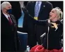  ?? (The New York Times/ Ruth Fremson) ?? Lady Gaga sings the national anthem at the inaugural. At left is Vice President Mike Pence.