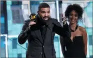  ?? MATT SAYLES — INVISION ?? Drake accepts the award for best rap song for “God’s Plan” at the 61st annual Grammy Awards on Sunday, Feb. 10, in Los Angeles.