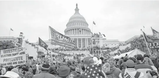  ?? JOSE LUIS MAGANA/AP ?? Rioters loyal to President Donald Trump rally Jan. 6, 2021, at the U.S. Capitol in Washington.