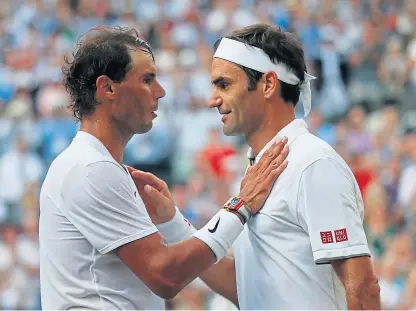  ?? Tennis greats Rafael Nadal, left, and Roger Federer. ??