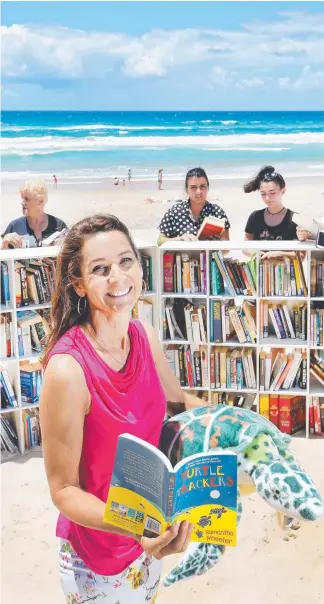  ?? Picture: GLENN HAMPSON ?? Local author Samantha Wheeler will return to the pop-up library at Surfers Paradise at noon tomorrow for a reading from her new book Turtle Trackers.