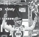  ?? PETER CASEY/USA TODAY SPORTS ?? Chase Elliott celebrates winning the Xfinity 500 on Sunday at Martinsvil­le Speedway.