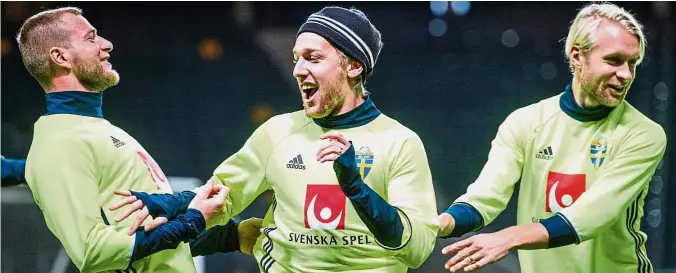  ?? — AFP ?? All’s calm: Sweden’s (from left) John Guidetti, Emil Forsberg and Johan Larsson fooling around during training in Solna yesterday.